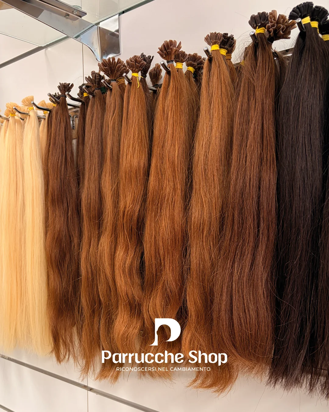 Capelli naturali in una selezione di tonalità dal biondo al castano
